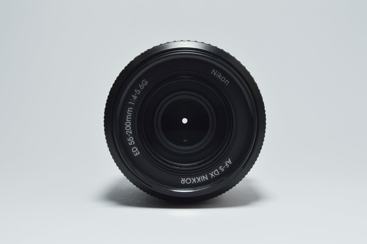 about-us High-quality image of a Nikon camera lens, ideal for photography enthusiasts and professionals.